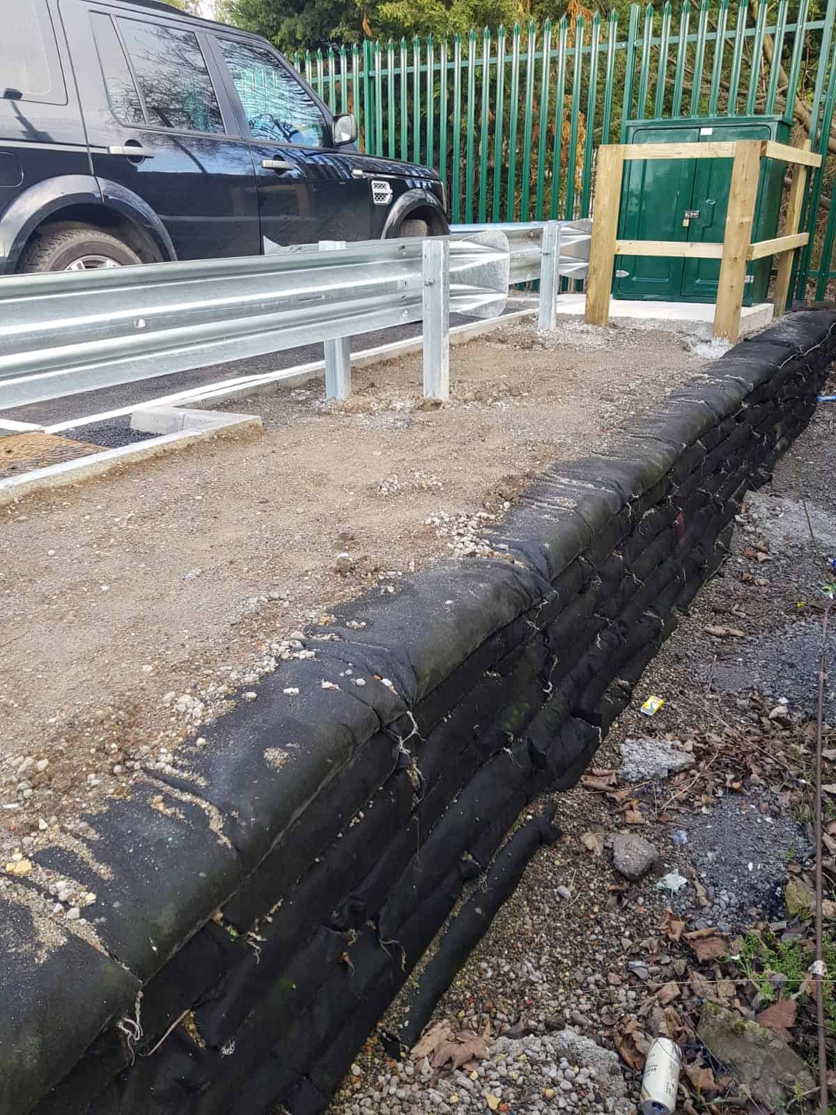 Vehicle barrier installed behind ECO-MSE retaining wall at Normanton Station Car Park
