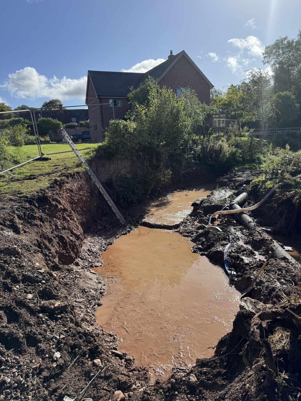 Eroded riverbank in Bouldon Shropshire before ECO-MSE erosion control works