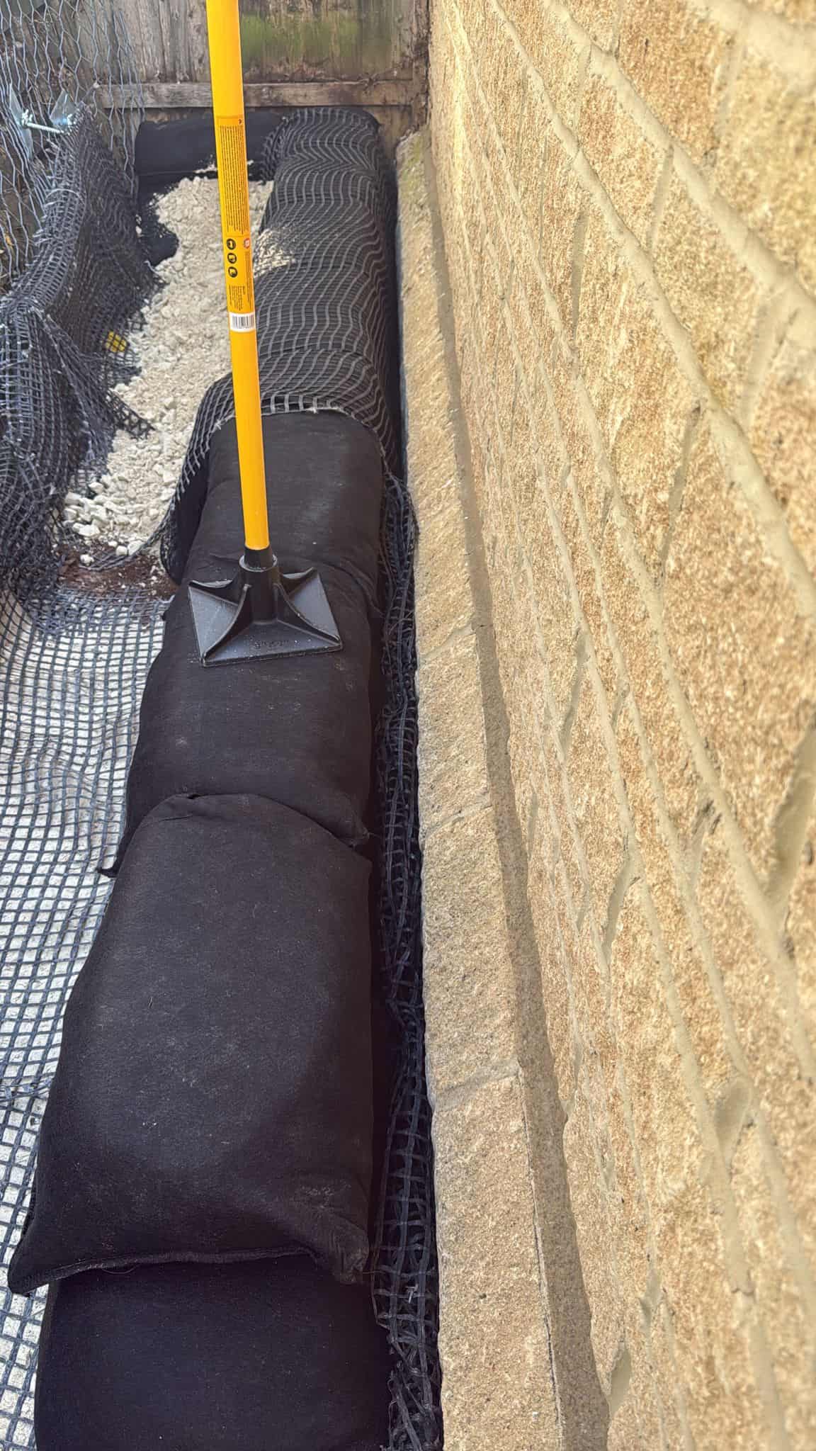 Stage 04 of ECO-MSE timber crib wall repair in Peterborough private garden