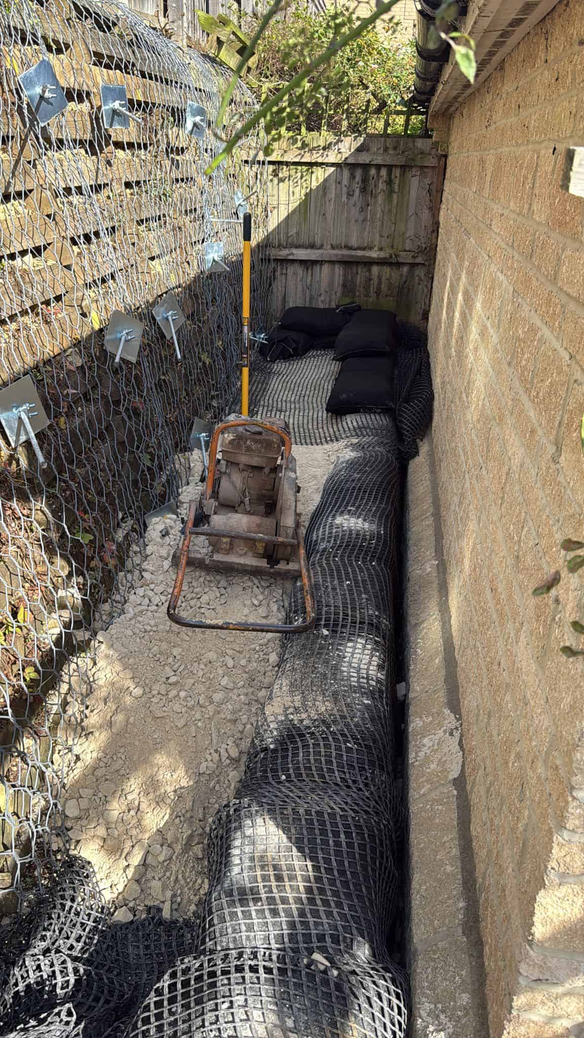 Stage 05 of ECO-MSE timber crib wall repair in Peterborough private garden