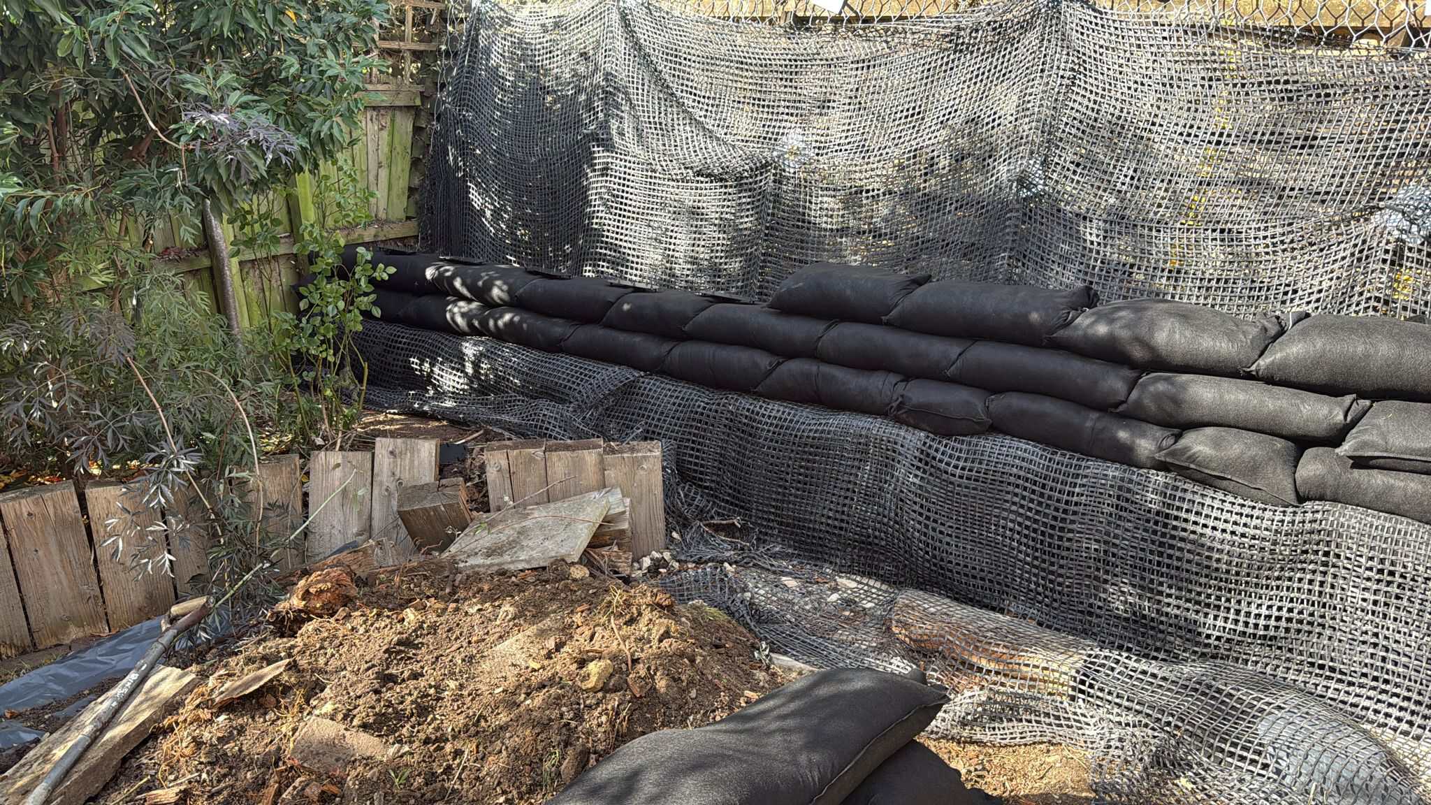 Stage 07 of ECO-MSE timber crib wall repair in Peterborough private garden