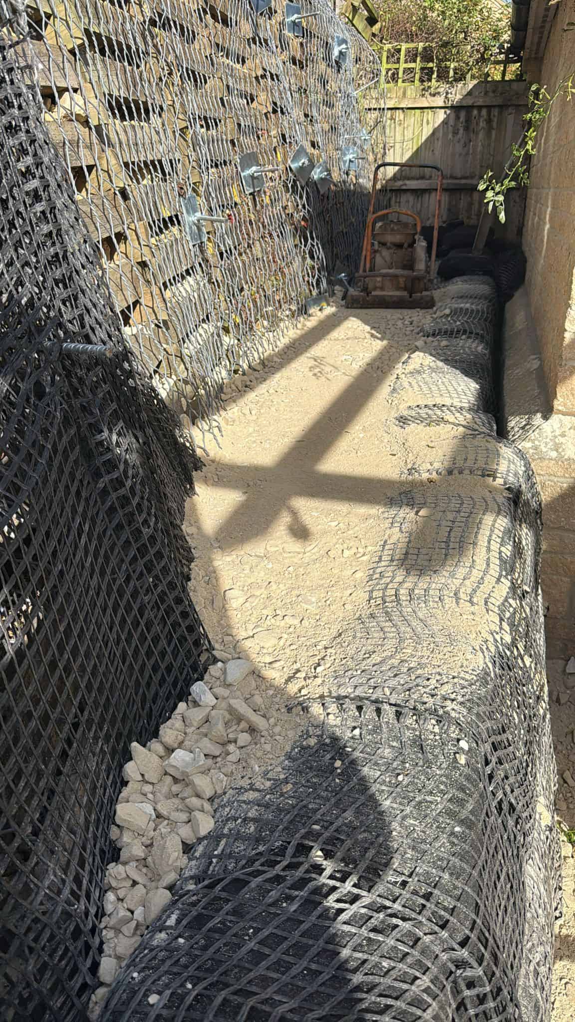 Stage 09 of ECO-MSE timber crib wall repair in Peterborough private garden