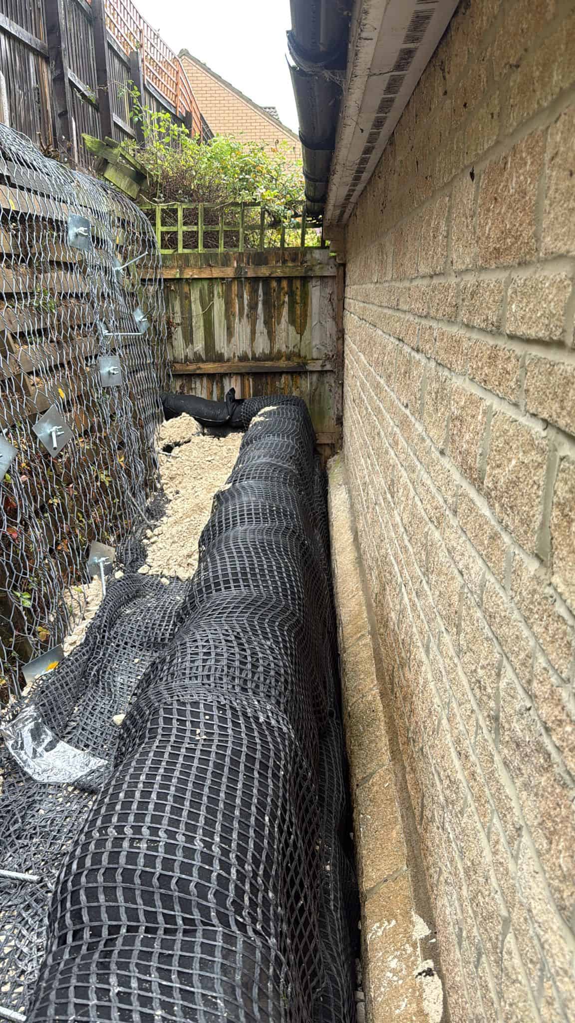 Stage 11 of ECO-MSE timber crib wall repair in Peterborough private garden
