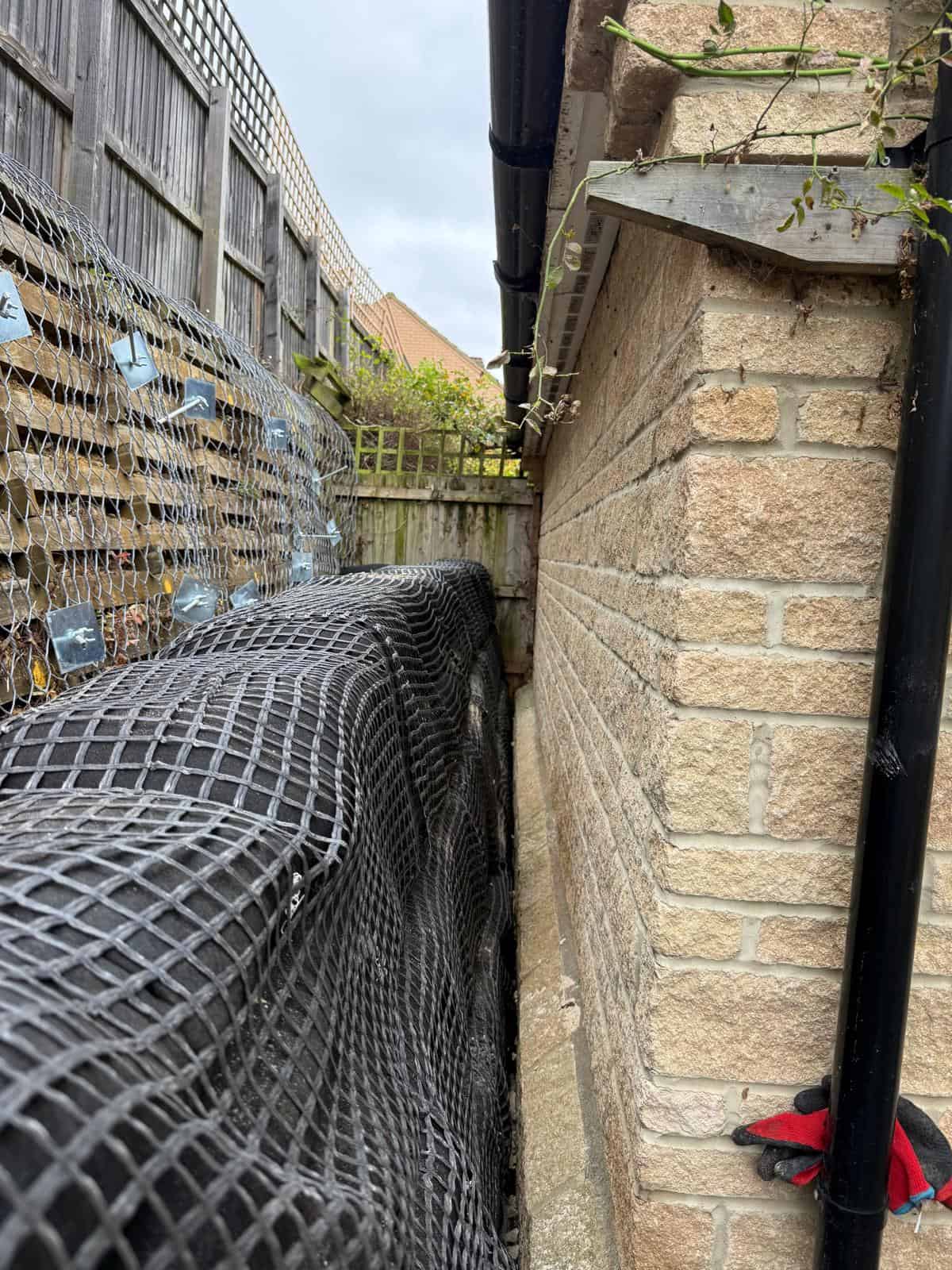 ECO-MSE bags installed to support a failing timber crib wall in Peterborough private garden